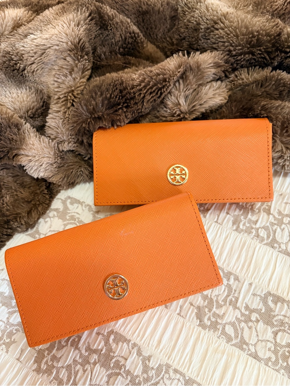 2 Tory Burch Orange Saffiano Leather Continental sunglasses cases.